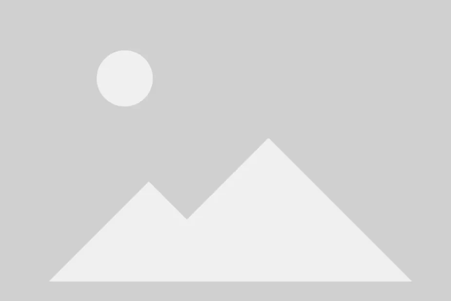 A placeholder image of a mountian and a sun in greyscale. 