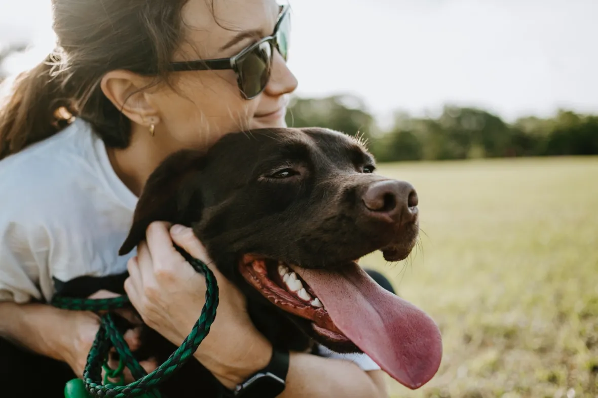smiling woman and dog
